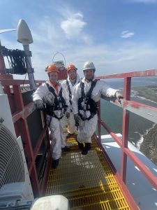 Calvin Stewart, Michael Johnstone, Niall Gibb at top of wind turbine -WTT pilot